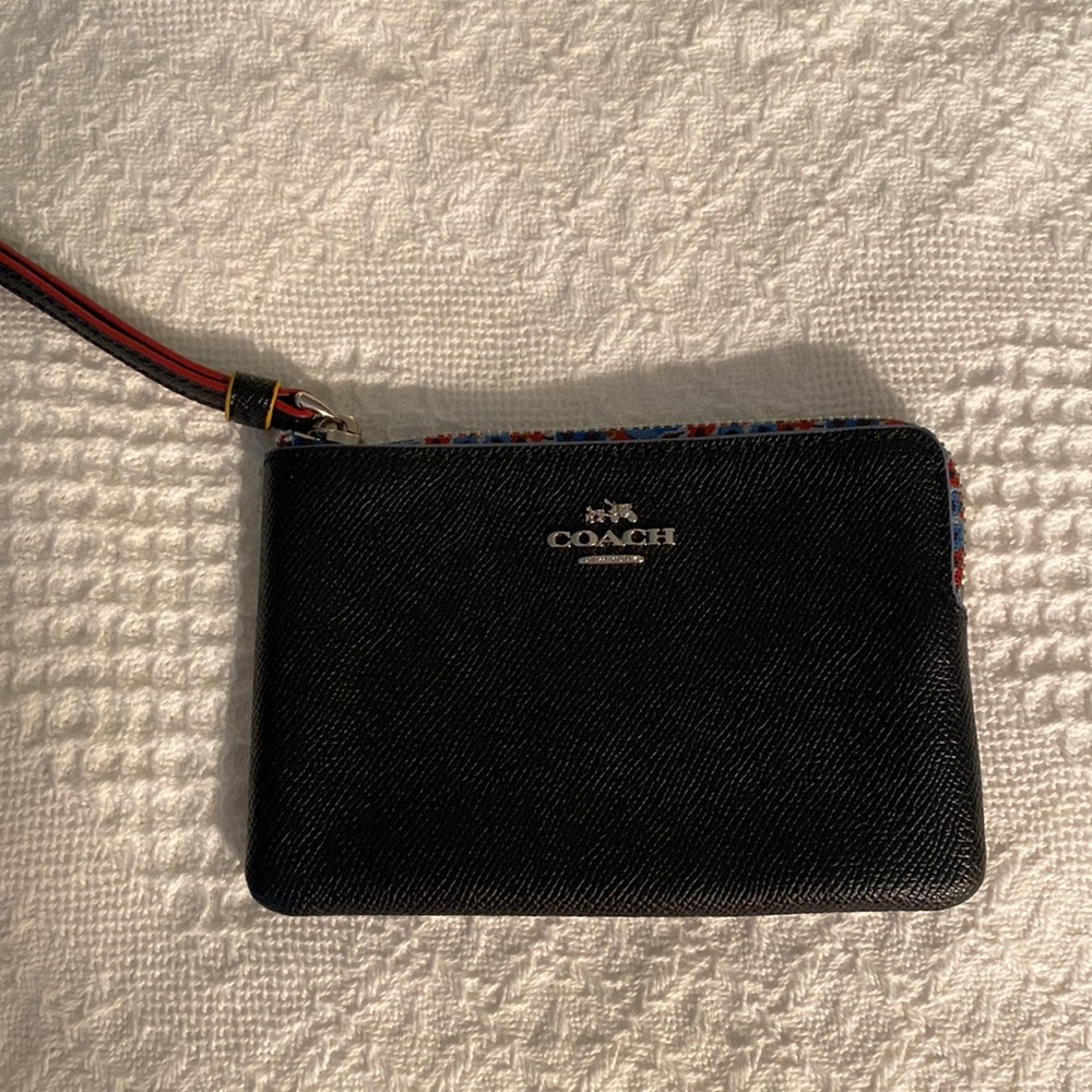 Small black leather Coach wristlet